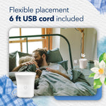 Lifestyle image of couple in bed with Glade ScentFlow device on bedside table and overlay text noting a 6 ft USB cord included