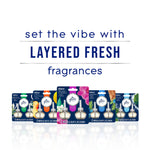 Promotional panel reading 'set the vibe with LAYERED FRESH fragrances' with a row of various Glade refill packages
