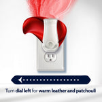 Glade plug-in device in outlet with red leather swirl and instruction to turn dial left for leather