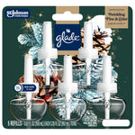 Glade Twinkling Pine & Cedar plug-in scented oil five-refill blister pack front view with rub-here scent callout