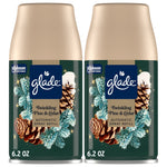 Two Glade Twinkling Pine & Cedar automatic spray refill cans with pinecone and frosted pine artwork