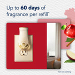 Glade plug-in warmer plugged into an outlet with text stating up to 60 days of fragrance per refill