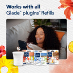 Smiling woman relaxing on a couch beside images of Glade Scent Flow device and multiple refill packages showing compatibility.