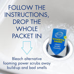 Glisten branded scrubbing packet being dropped into a sink drain with overlaid instruction text and arrow graphic.