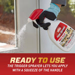 Hand wearing glove holding Ortho Home Defense bottle and spraying a mist at a glass door, ready-to-use text below