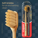 Large gold toothbrush head beside packaged Colgate Harry Potter two-pack on a dark patterned background with 'Soft bristles' text