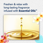 Graphic showing a golden oil droplet falling into a ripple with text about long-lasting fragrance infused with essential oils and floral accents.