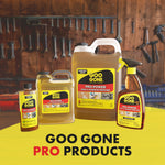 Product family shot showing multiple sizes and formats of Goo Gone Pro-Power containers arranged on a workbench background