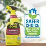 Goo Gone bottle beside a large Safer Choice certification badge and blurred indoor background on a tabletop