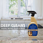 Granite Gold spray bottle on a polished kitchen countertop with 'DEEP CLEANS' text and stone surface callout