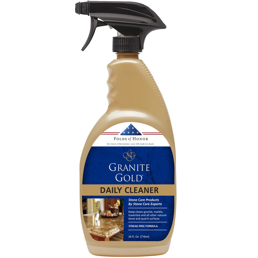 Granite Gold daily cleaner spray bottle with blue and gold label shown on a white background