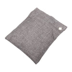 Gray textured air-purifying sachet angled on a white background showing metal grommet