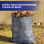 Gray outdoor trash bag filled with leaves standing on grass in front of a wooden fence with product headline above
