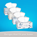 Four decorative rectangular tissue boxes with white tissues fanned up, arranged diagonally on a blue background.