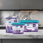 Three Great Value dishwasher pacs packages in different sizes arranged on a marble counter in a kitchen setting