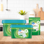 Kitchen lifestyle scene showing three Great Value dishwasher pacs packages in varying sizes on a counter
