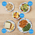 Assortment of decorative disposable plates and bowls on a wood surface with food, including a 20 oz bowl and blue size callouts.