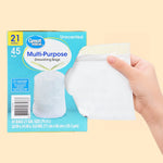 Hand holding a tear-open sample section from a Great Value 21-gallon drawstring bag box showing an inner bag pull-out
