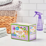 Box of Great Value Ultimate Fresh dryer sheets displayed on a countertop with laundry basket and spray bottle background