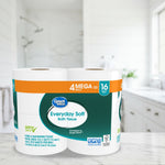 Great Value Everyday Soft bath tissue four-mega-roll pack displayed on a bathroom countertop with blurred background.
