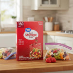 Great Value quart storage bags box on a kitchen counter with two filled resealable bags of fruit beside it