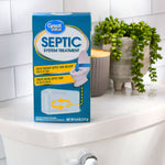 Great Value Septic System Treatment box staged on a toilet tank with bathroom decor in the background.