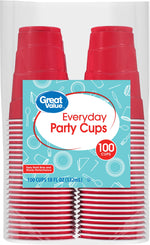 Close-up of packaged stacks of red disposable cups showing Great Value Everyday Party Cups label and 100 count badge