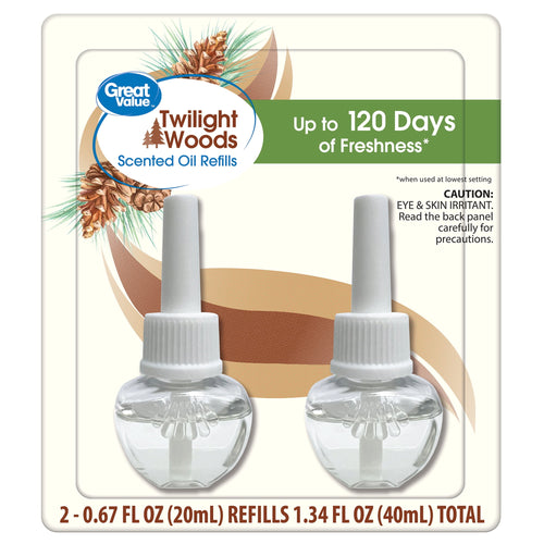 Packaged Great Value Twilight Woods scented oil refill twin bottles shown on product blister card with pinecone artwork