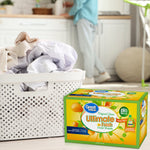 Lifestyle scene with a laundry basket and a Great Value Ultimate Fresh dryer sheets box placed on a light floor near a kitchen setting