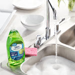 Great Value Ultra dish liquid bottle beside a kitchen sink with soapy water and sponge