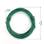 Top-down view of a coiled green vinyl-covered garden wire with dimension callouts on white background