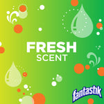 Green gradient background with bubbles and text 'Fresh Scent' plus Fantastik logo and decorative droplets
