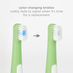 Close-up comparison of a green toothbrush head showing blue color-changing bristles fading to signal replacement, with arrow graphic.