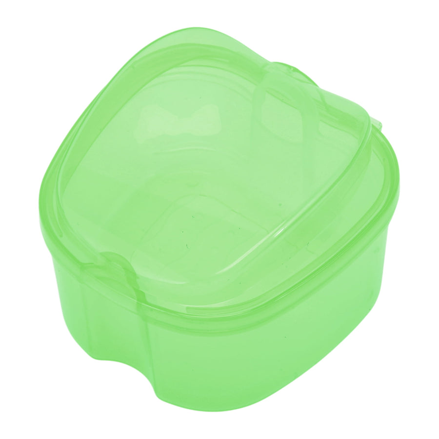 Translucent green plastic orthodontic retainer or braces storage box photographed on white background