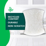 Close-up white scrub sponge on kitchen background with green panel listing “Recycled Content, Durable, Non-Scratch”