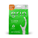 Green resealable pouch of Grin Clean minty floss picks showing a single white floss pick and recycling symbol
