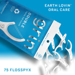 Angled lifestyle-style pack image with Grin pouch spilling multiple white floss picks on blue background