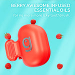 Close-up floating red Grin brushcap with small raspberries and text advertising berry-infused essential oils on blue background