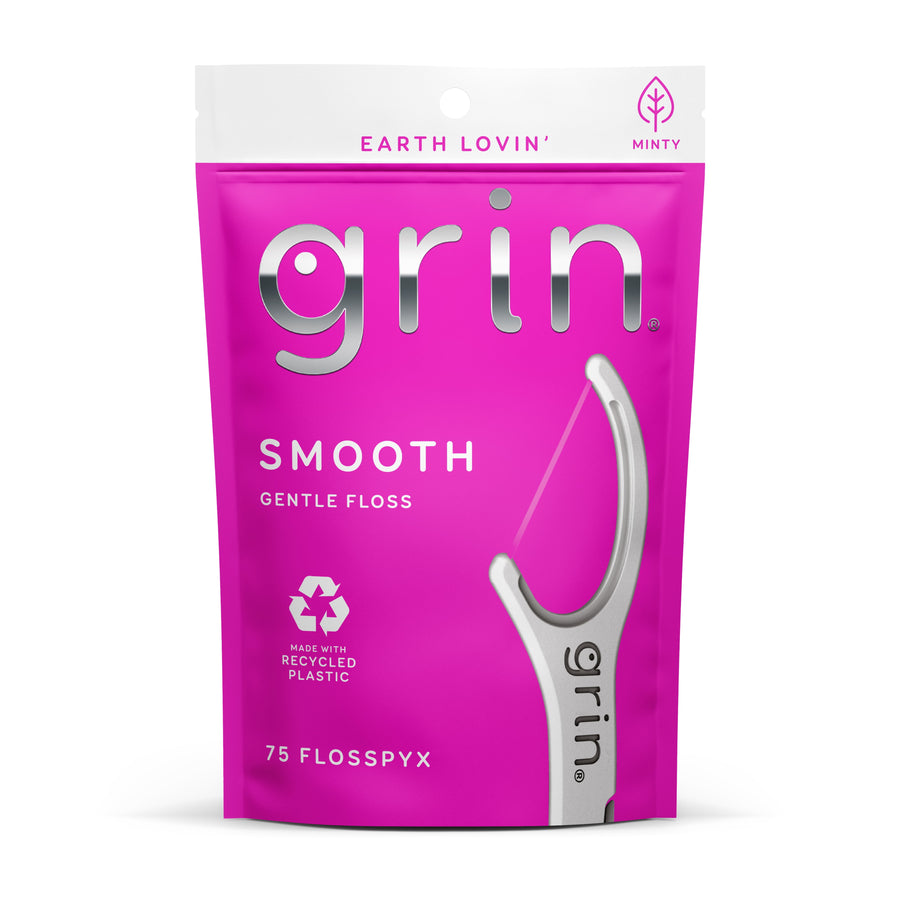 Front-facing magenta pouch of Grin Smooth gentle floss picks showing brand name and a single floss pick illustration