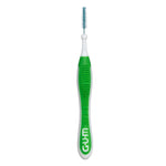 Green-handled GUM interdental brush isolated on white background showing bristled brush tip and textured grip