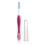 Single pink-handled GUM interdental brush shown upright beside a clear protective cap on white background