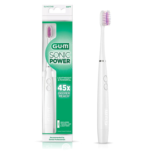 G•U•M Sonic Power battery toothbrush in white shown next to its green-and-white retail blister packaging.