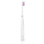 White G•U•M Sonic Power battery toothbrush upright on a white background showing tapered brush head and control buttons.