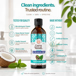 GuruNanda oil pulling oral rinse bottle with ‘Clean ingredients. Trusted routine.’ headline and list of tests and made-with claims