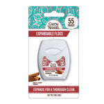 Single GuruNanda cinnamon expandable floss retail blister card showing 55 yards label and cinnamon image