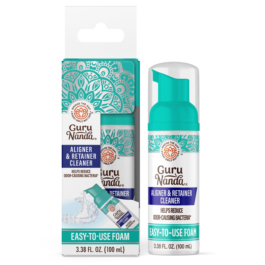 GuruNanda Aligner & Retainer Cleaner foam bottle shown next to its teal-and-white retail box with product branding.