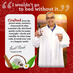 Promotional panel with founder holding a GuruNanda bottle, quote about nightly use, and coconut and spice imagery at bottom.