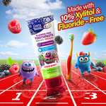 Dynamic scene with GuruNanda Kids toothpaste tube, toothbrush and cartoon monsters racing on a track with floating berries