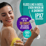 Lifestyle image of a woman in the shower holding a GuruNanda compact water flosser with IPX7 and charging callouts