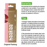 Image of original Haakaa packaging box alongside product guarantee and tips text in English